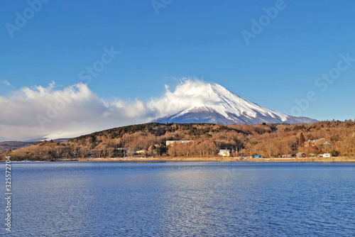 Lake, sky and Fuji mountain with snow in Japan countryside