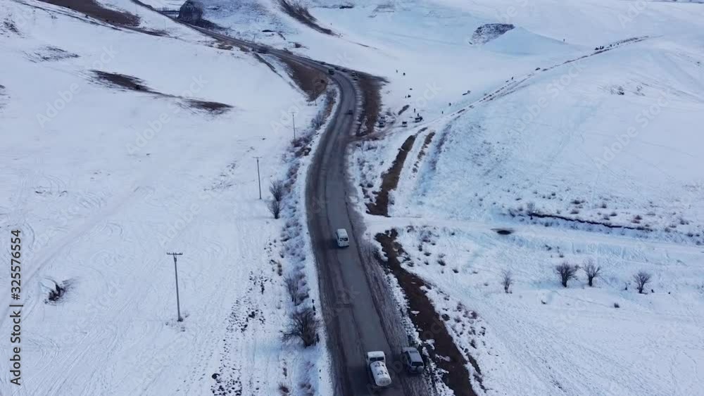 The road to top of mountain in Kyrgyzstan , winter. The road to top of mountain in Kyrgyzstan , winter.
