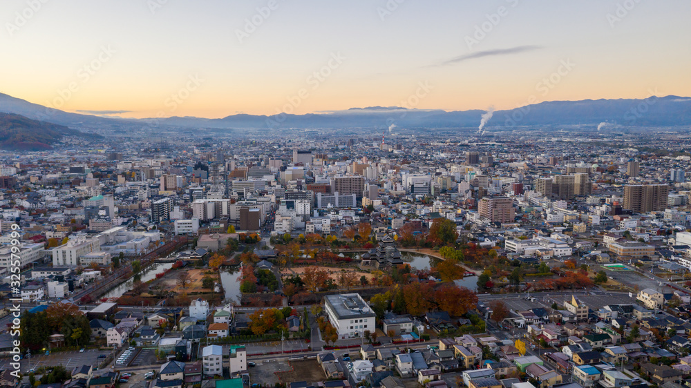 Fototapeta premium Aerial view Sunrise of Matsumoto Castle in Nagano City,Japan