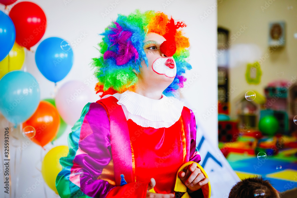 Children play with a clown Children play with a clown