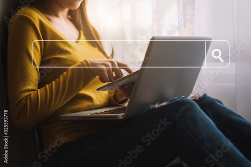 Searching Browsing Internet Data Information with blank search bar.businessman working with smart phone, tablet and laptop computer on desk in office. Networking Concept 