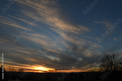 open cloudy sky at sunset