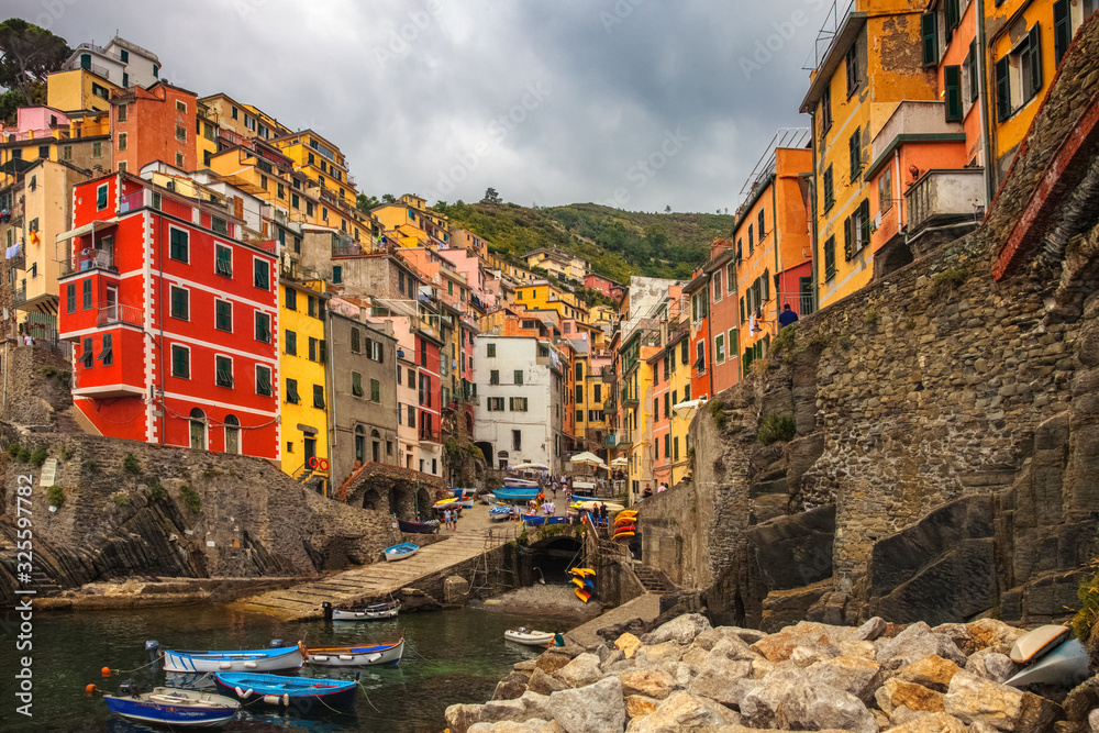 Colorful coastal town of Riomaggiore, part of the Cinque Terre along the coast of Italy