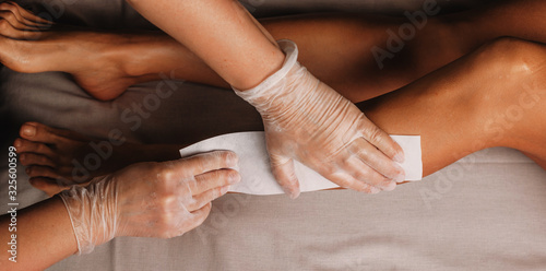 Caucasian girl with nice legs is having an anti aging treatment at professionals