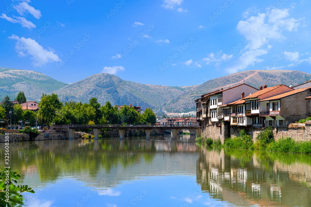 Fototapeta premium Amasya/Turkey- August 09 2019: Panoramic Amasya city view. Beautiful river landscape and Amasya city between mountains.