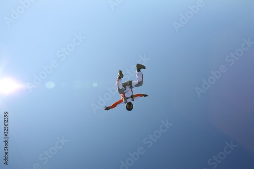 Wild. Man in free flight. Parachuting entertainment for active people.