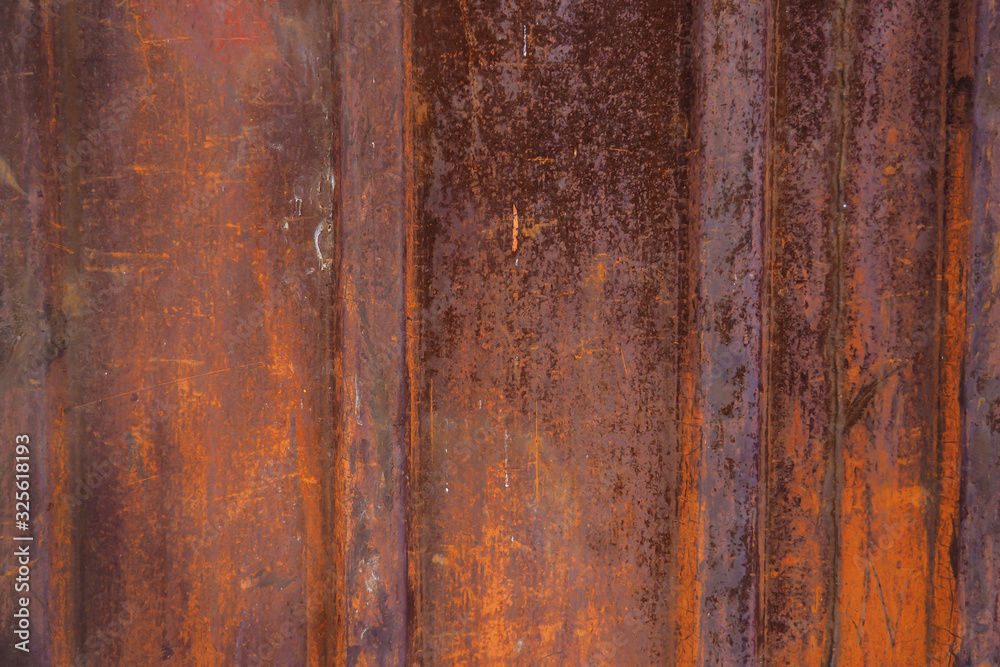 Texture of a rusted metal surface with vertical lines. Texture of a rusted metal surface with vertical lines.