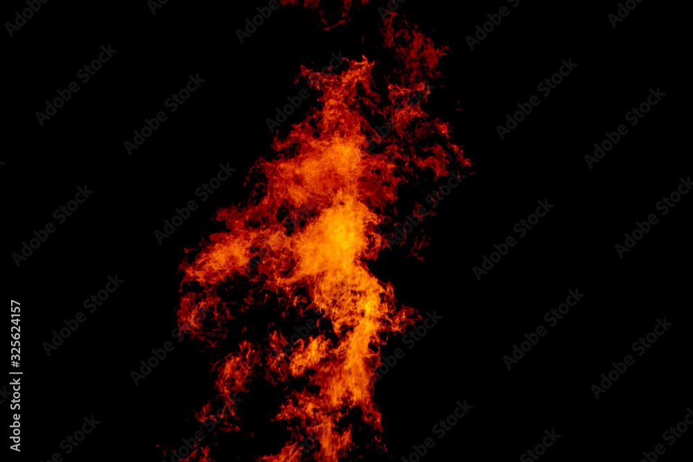 Yellow red and orange fire flames blazing fiery burning isolated on a black background