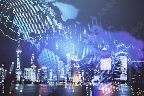 Financial graph on night city scape with tall buildings background double exposure. Analysis concept.