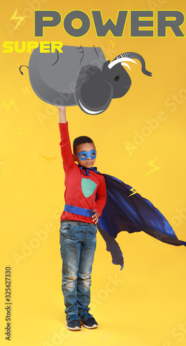 Strong little superhero hol...