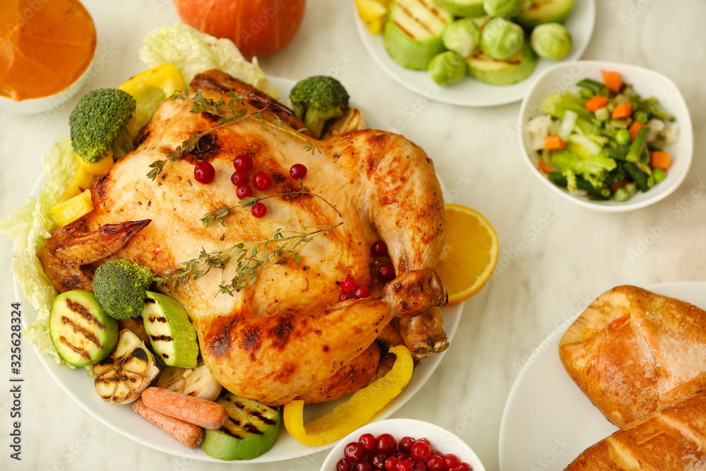 Tasty baked turkey for Thanksgiving day on table Tasty baked turkey for Thanksgiving day on table
