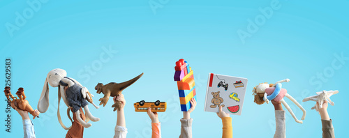 Children holding toys, concept of the childhood photo