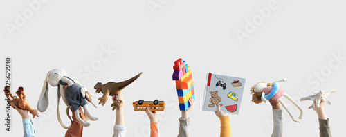 Children holding toys, concept of the childhood photo