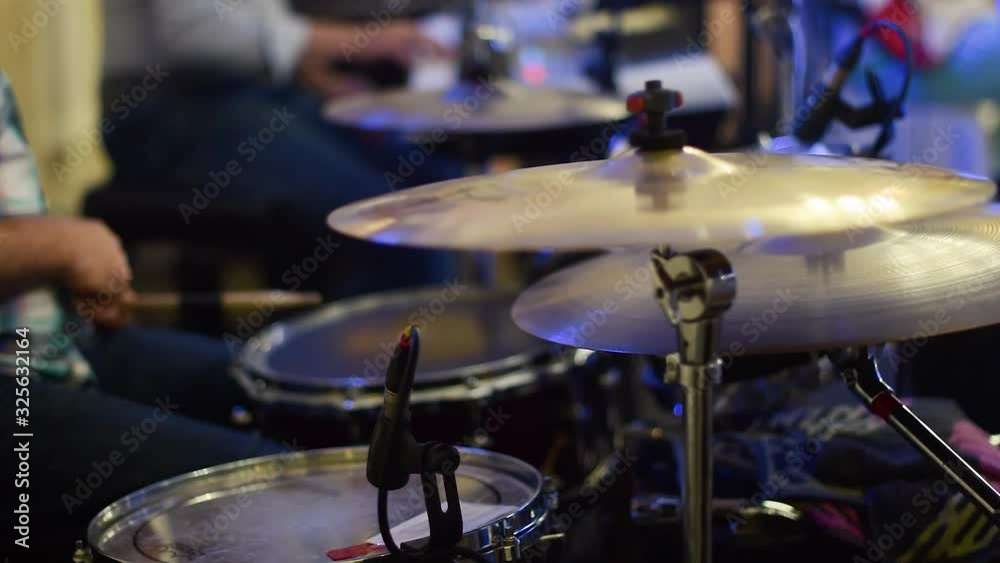Musician playing drums at restaurant Musician playing drums at restaurant
