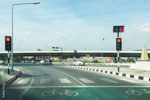 Transportation superhighway image above traffic circle at  suburb area of Bangkok Thailand on freshness tropical summer morning sky.