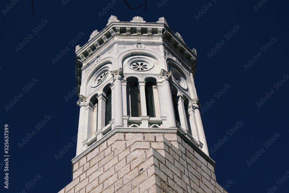 The bell tower of Christian orthodox church in Athens, Greece. The bell tower of Christian orthodox church in Athens, Greece.