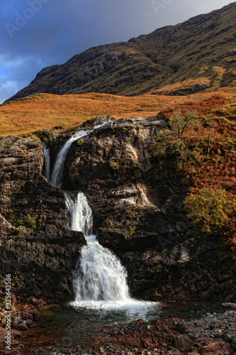 Scenic waterfall along the road through Glencoe towards Ballachulish in the scottish Highlands  Scotland