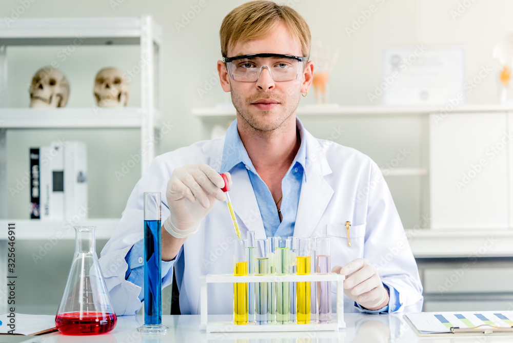 Scientists working in laboratory Scientists working in laboratory