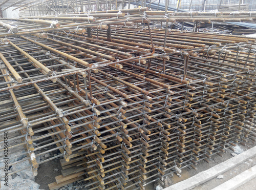 Hot rolled deformed steel bars or steel reinforcement bar tied together before cast in the concrete. Its function is to increase the concrete strength. 