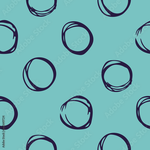 An abstract seamless pattern consisting of circles drawn by hand. Circles drawn in the style of a sketch by pen. Vector eps illustration.