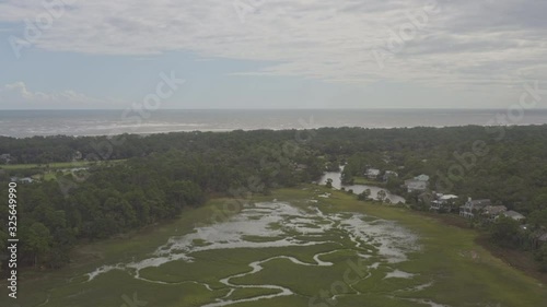 South Carolina Aerial v9 Panning around scenic Fripp Island residential community, wetlands, and oceanfront - September 2018 photo