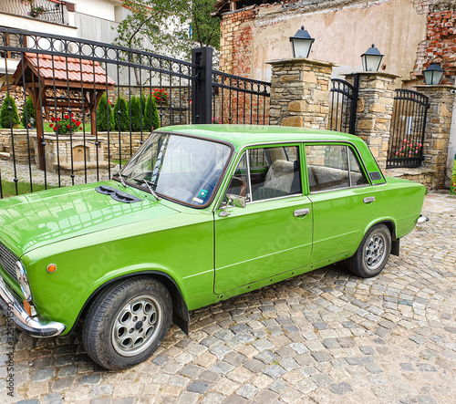 Lada - Old soviet sedan car. Russian classic car. Russian old car in green