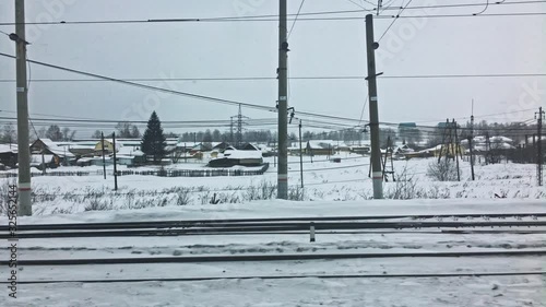 POV Shot From Tran-Siberian Railway Train. Small Community Of Kropachevo, Russia. photo