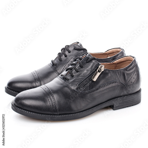 Black men's leather shoes isolated on white.