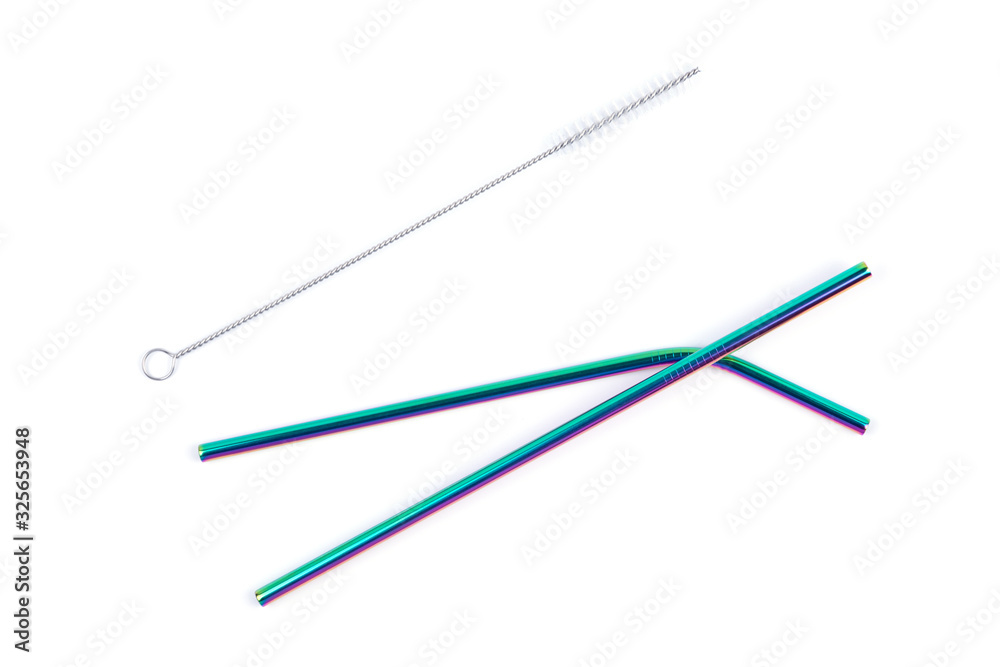 Top view of neon color metal stainless steel reusable drinking straws and cleaning brush isolated on white background. Zero waste and plastic free concept. Sustainable eco friendly lifestyle. Top view of neon color metal stainless steel reusable drinking straws and cleaning brush isolated on white background. Zero waste and plastic free concept. Sustainable eco friendly lifestyle.