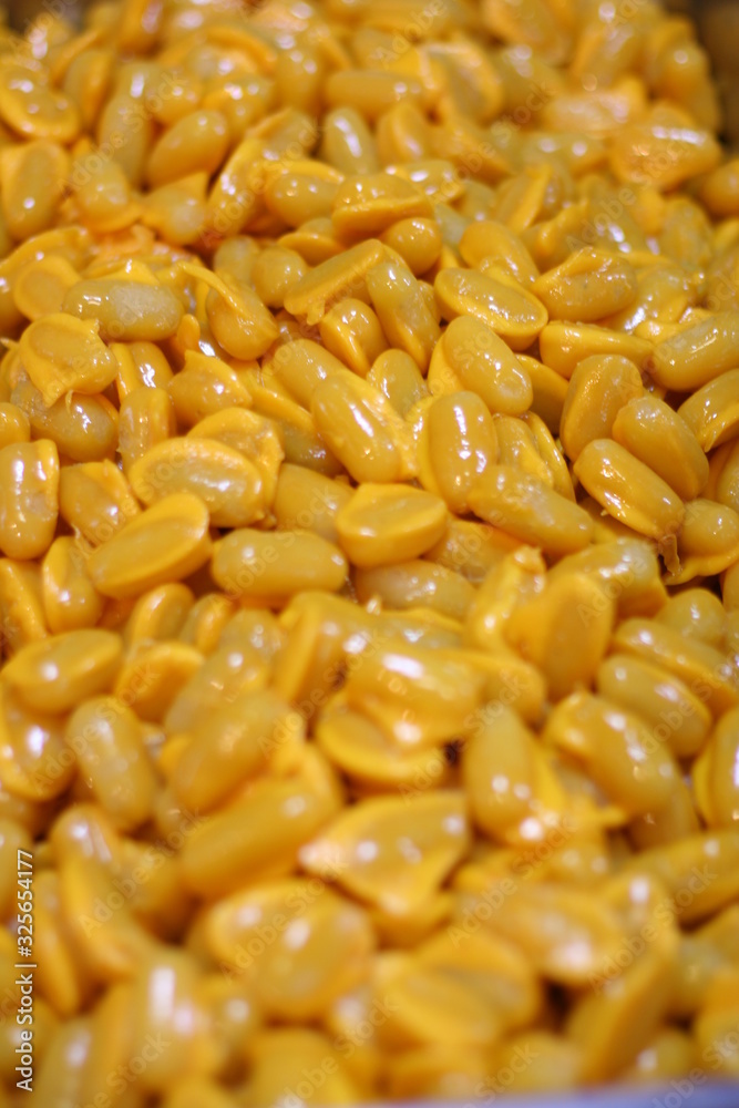 Thai dessert or Khanom Thai, mock jack fruit seeds is called Met Khanoon, idea use for background. Thai dessert or Khanom Thai, mock jack fruit seeds is called Met Khanoon, idea use for background.