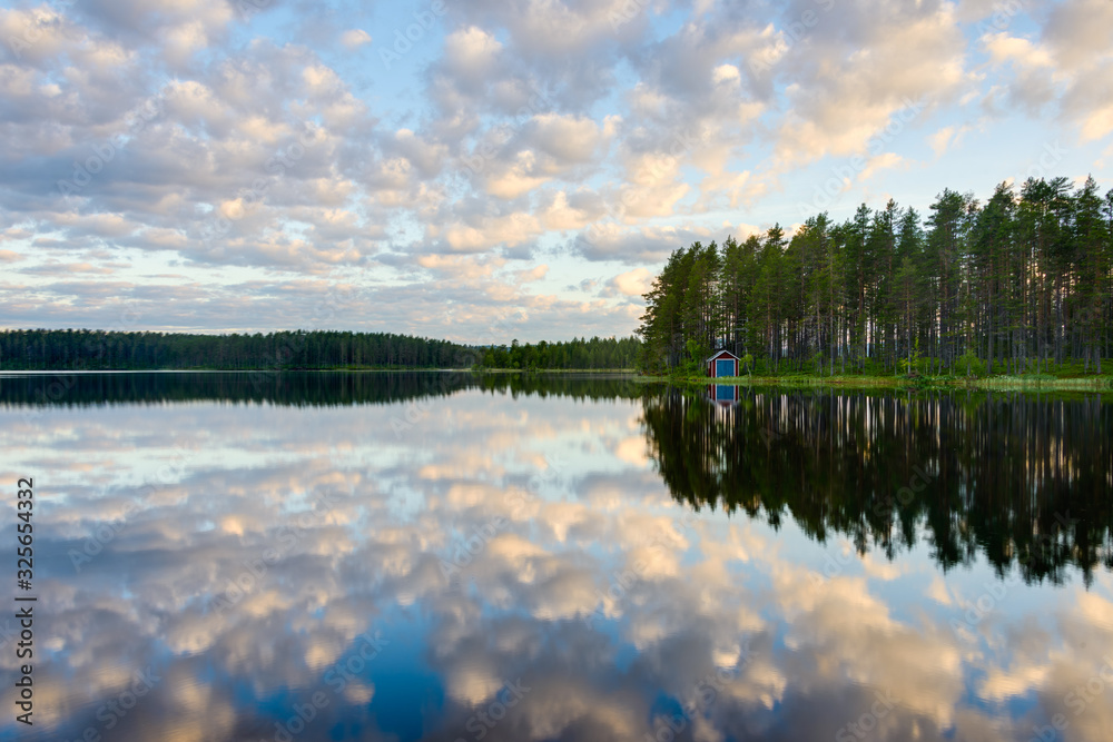 Lake with reflections of clouds, Dalarna, Sweden