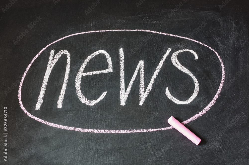 word news written on chalkboard