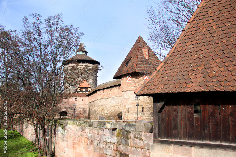 red tile roofs of the historic fortress of the old European city, romantic tourism concept