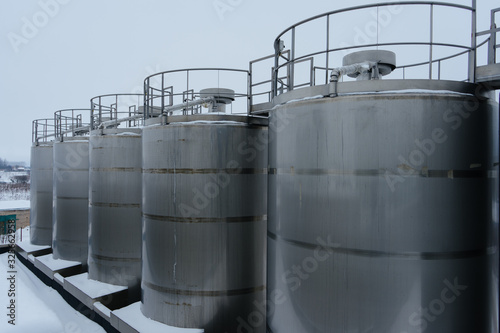 metal tanks at the enterprise for storage of dairy products