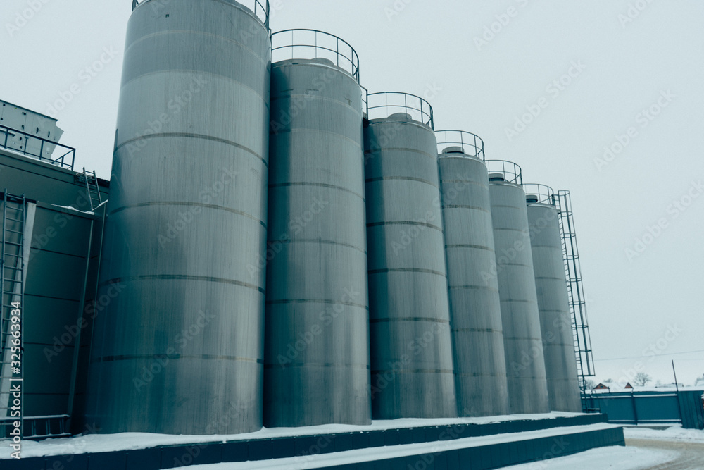 metal tanks at the enterprise for storage of dairy products