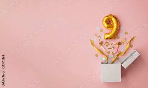 Number 9 birthday balloon celebration gift box lay flat explosion photo
