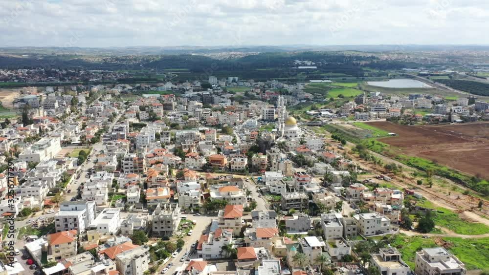 Aerial photo of an Arab, Palestinian village. A large golden mosque. Jaljulia Israel. Aerial photo of an Arab, Palestinian village. A large golden mosque. Jaljulia Israel.