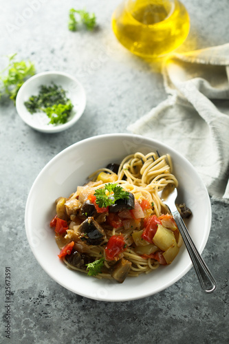 Spaghetti with vegetable ragout and fresh parsley
