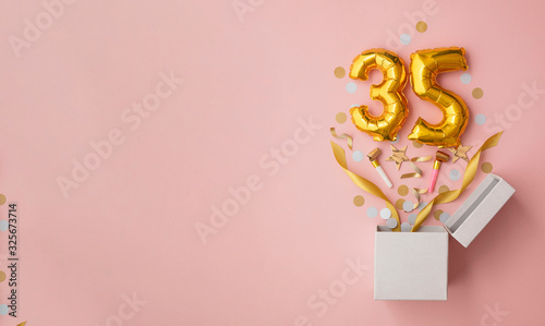 Number 35 birthday balloon celebration gift box lay flat explosion photo