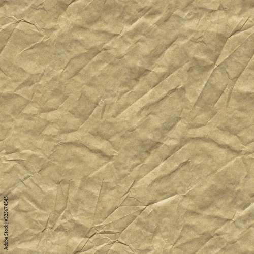 Crumpled paper background in brown color for your best greeting card. Seamless texture.