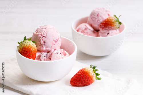 strawberry ice cream scoops with fresh strawberries