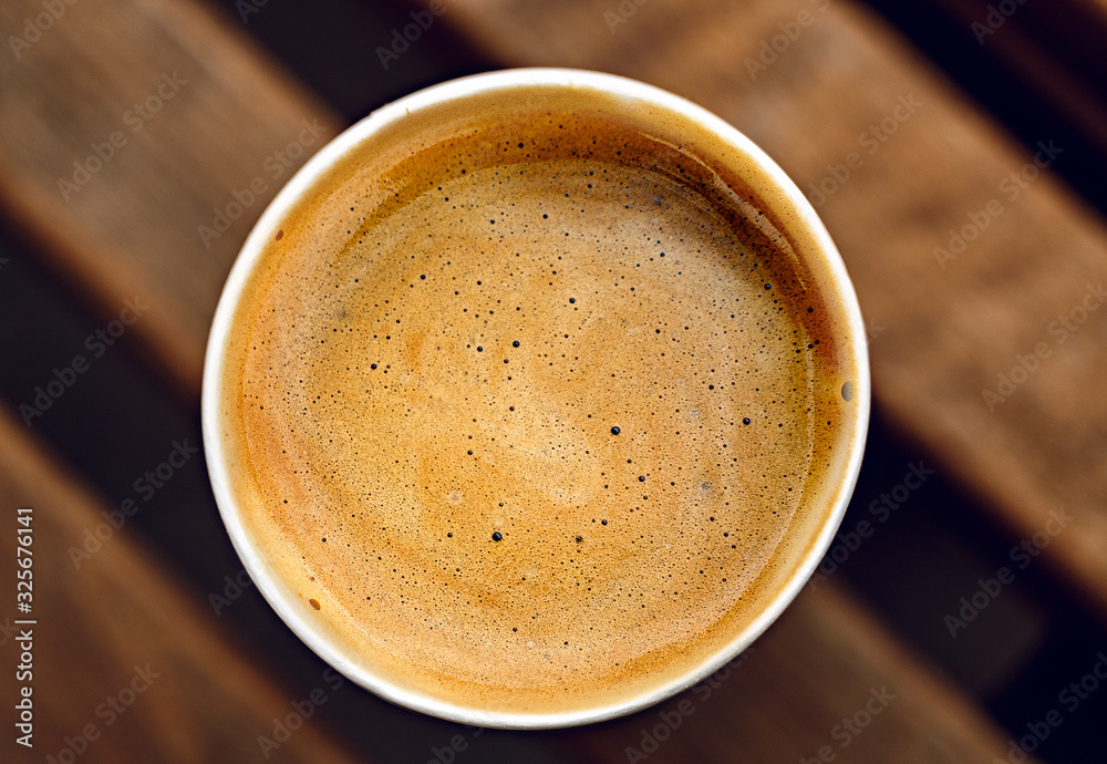 coffee foam in a disposable cup Stock Photo
