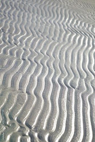 Rippled sand pattern at baltic sea beach