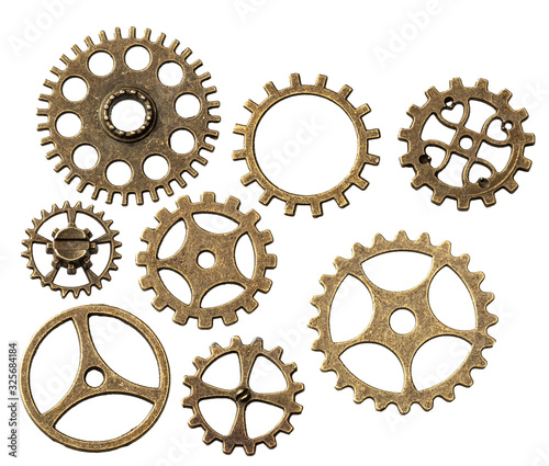 Set of old metal gears from clock isolated not white background