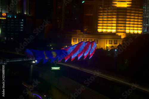 Saloma pedestrian bridge with Malaysian flag light.