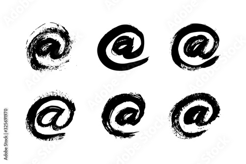 Email icon of ink brushstrokes. Vector grunge punctuation mark At sign