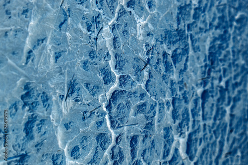 grunge background design. blue abstraction. water texture. cracked clay. color inversion