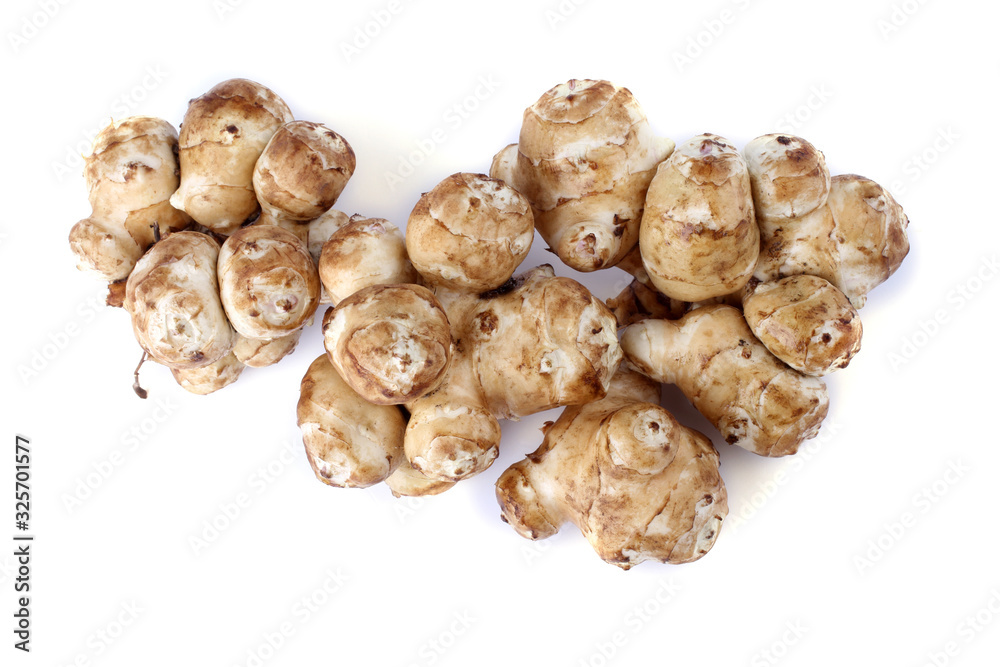 Jerusalem artichokes isolated on white