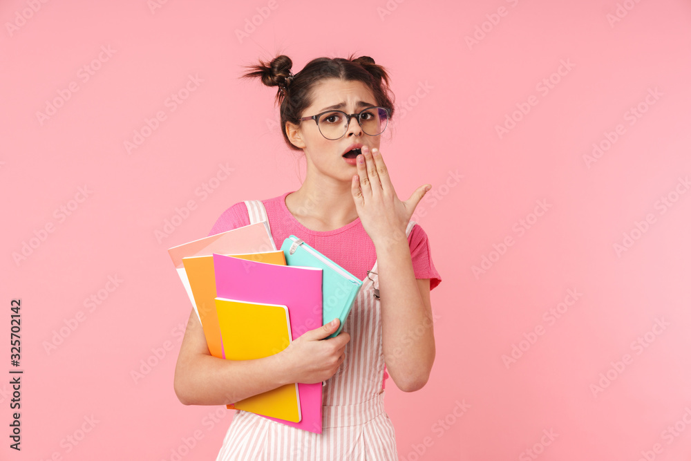 lovely happy teenage girl standing isolated over pink lovely happy teenage girl standing isolated over pink
