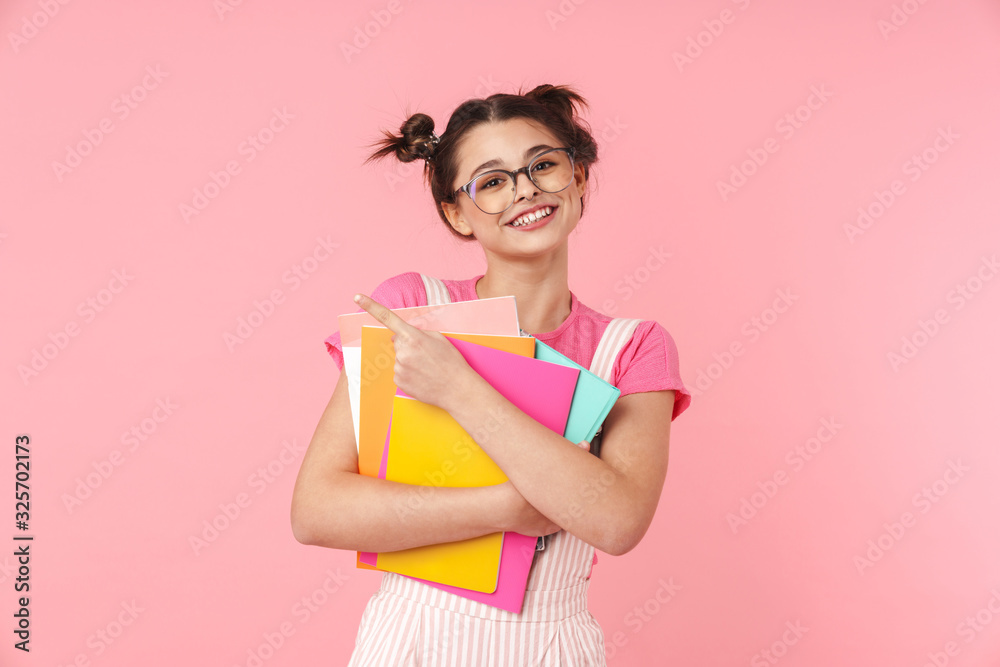 lovely happy teenage girl standing isolated over pink lovely happy teenage girl standing isolated over pink